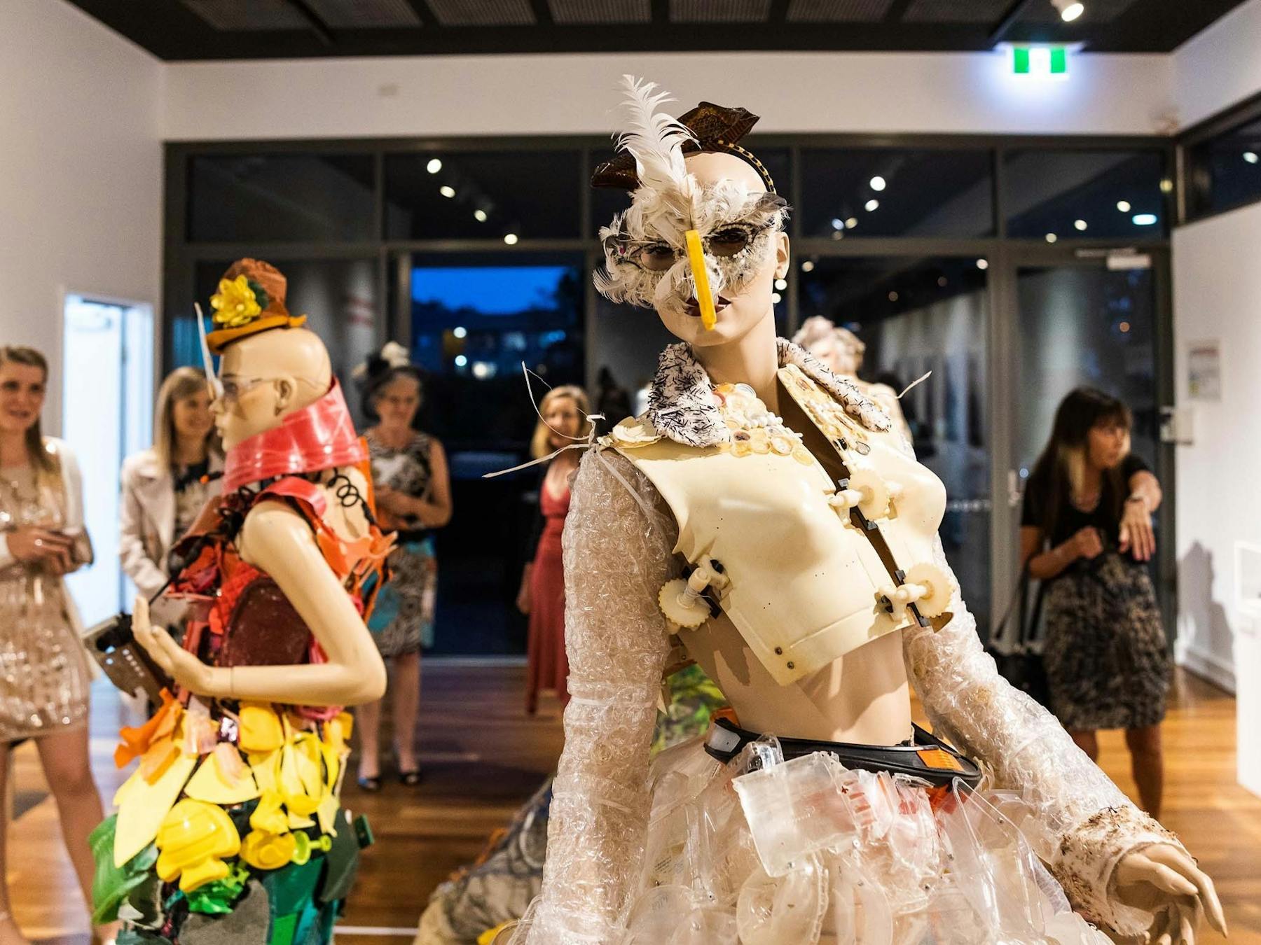 A group of women observing an art exhbition at Bribie Island Seaside Museum