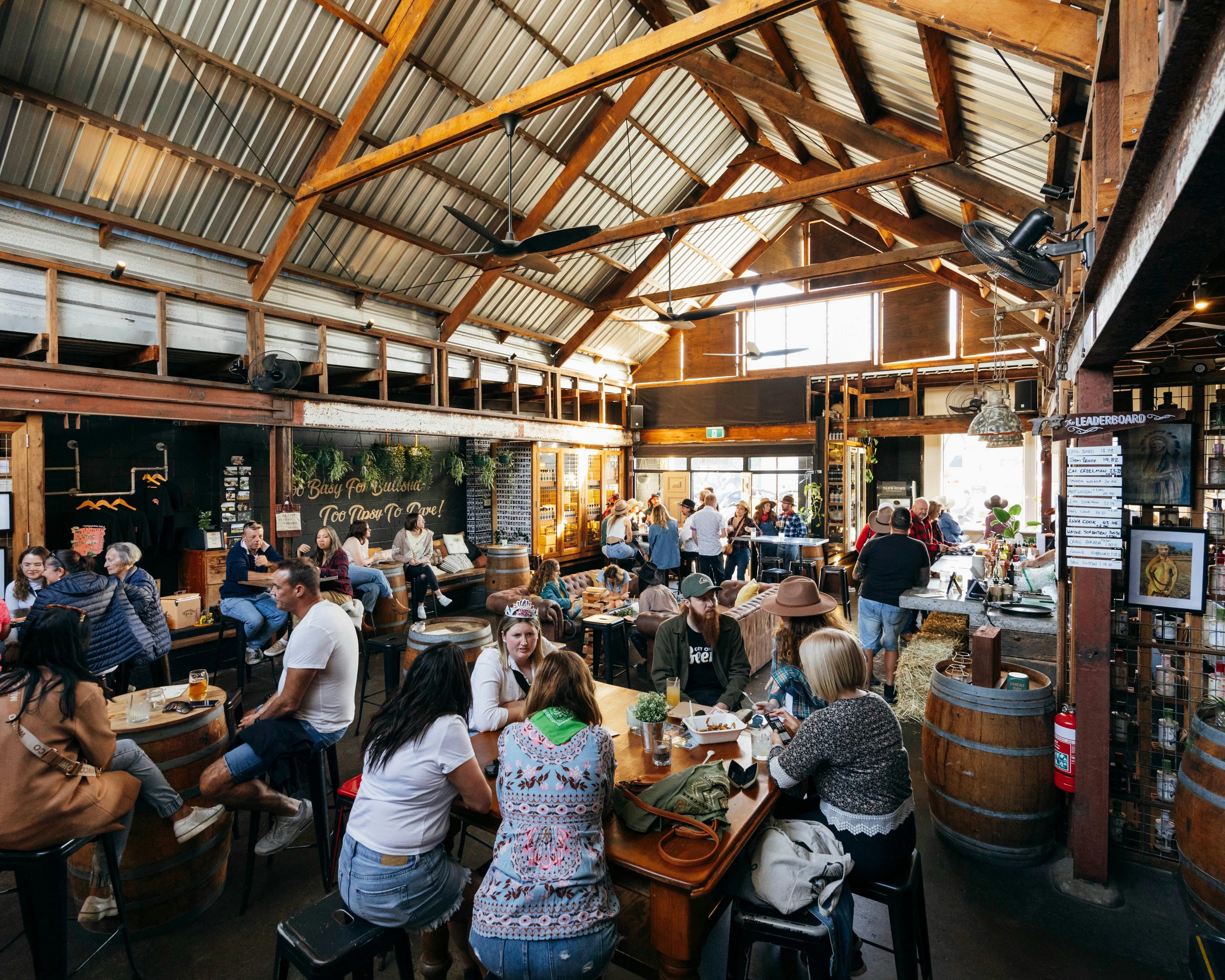 Inside Granddad Jack's Craft Distillery in Miami full of people during an event