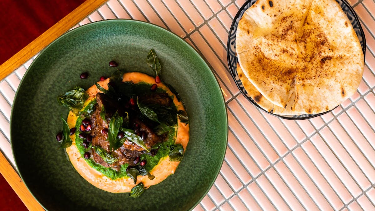 8 hour lamb shawarma, taramasalata, green zhoug
