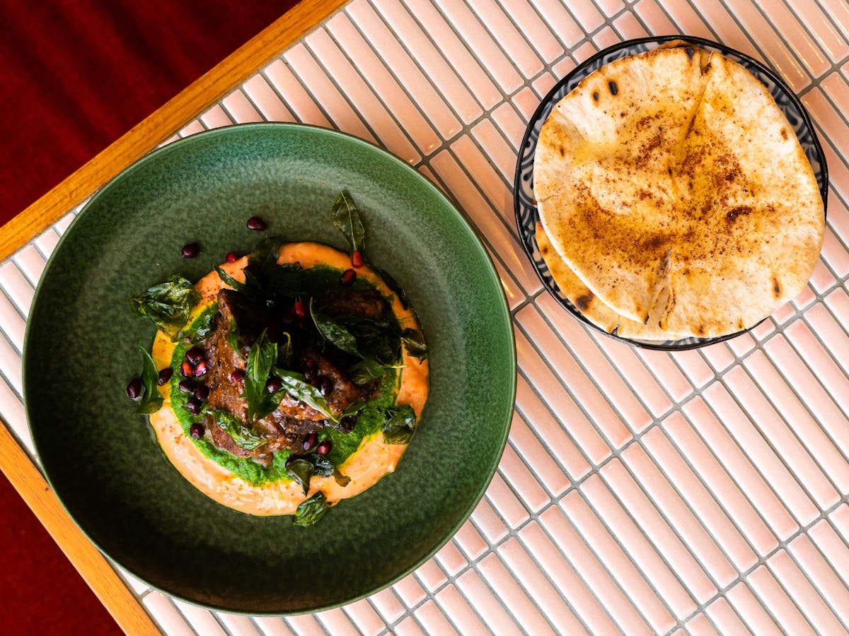 8 hour lamb shawarma, taramasalata, green zhoug