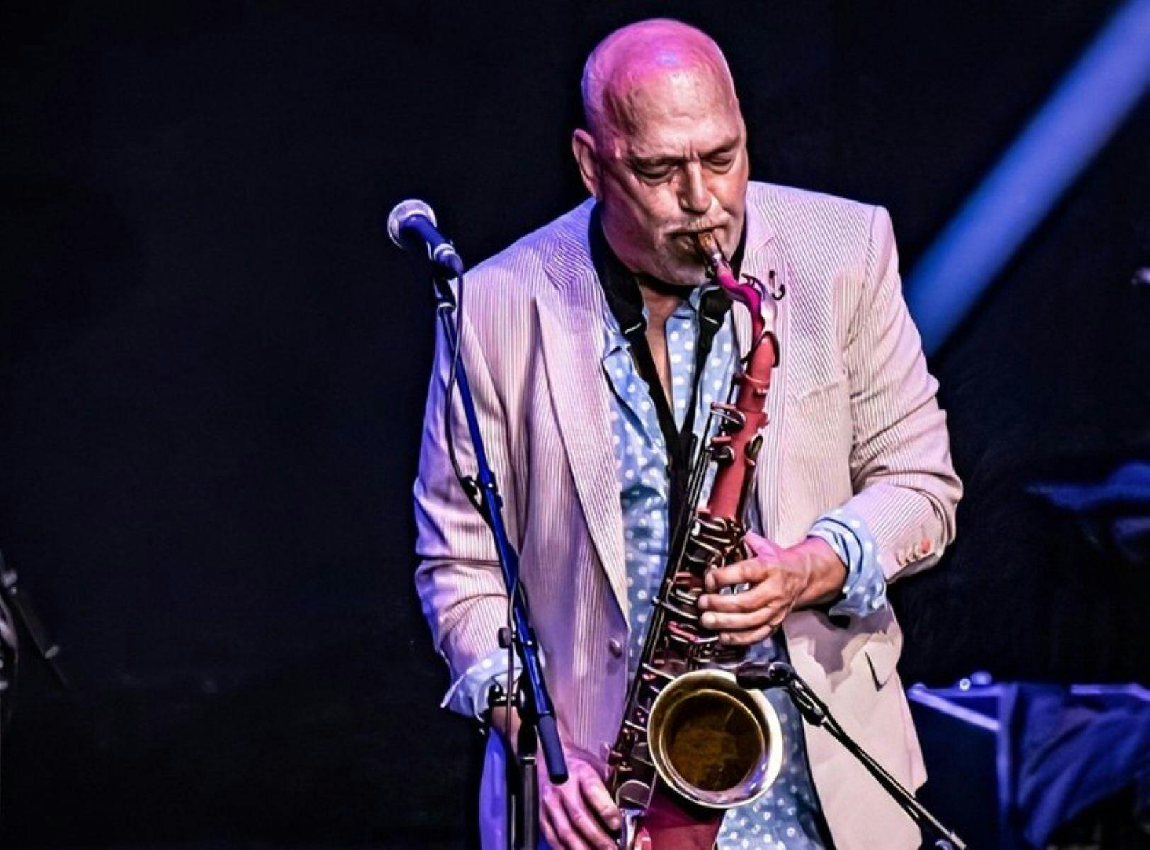 Man playing saxophone on stage