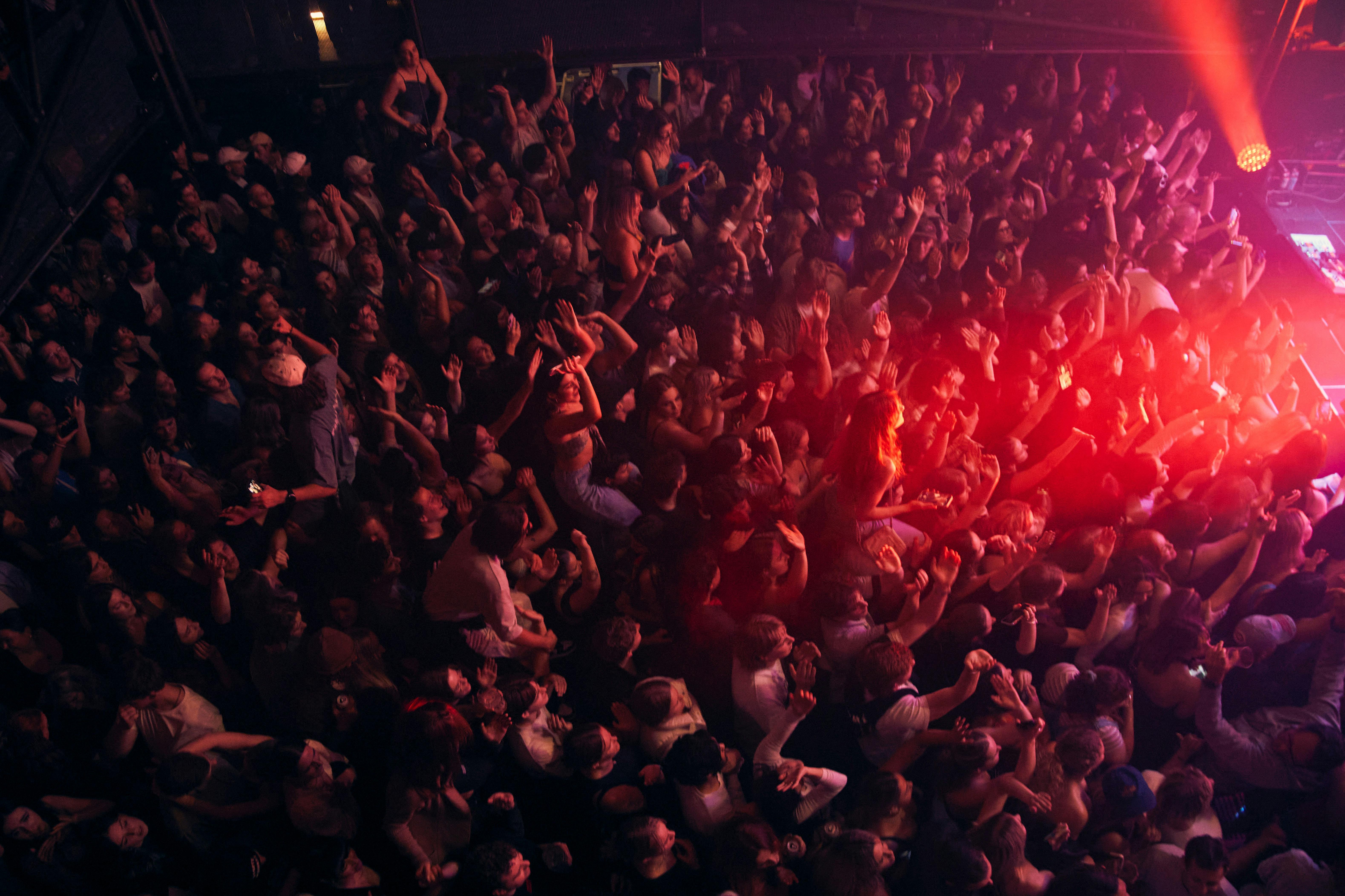 A crowd dances on the ground floor of Rechabite Hall.
