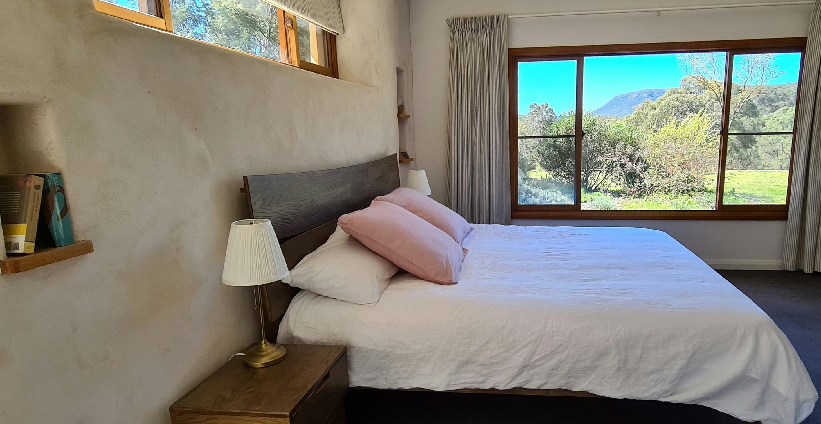 The King bedroom. One of four bedrooms. King, Queen, Double and Bunk.