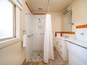 The  bathroom is very bright and all essentials are provided