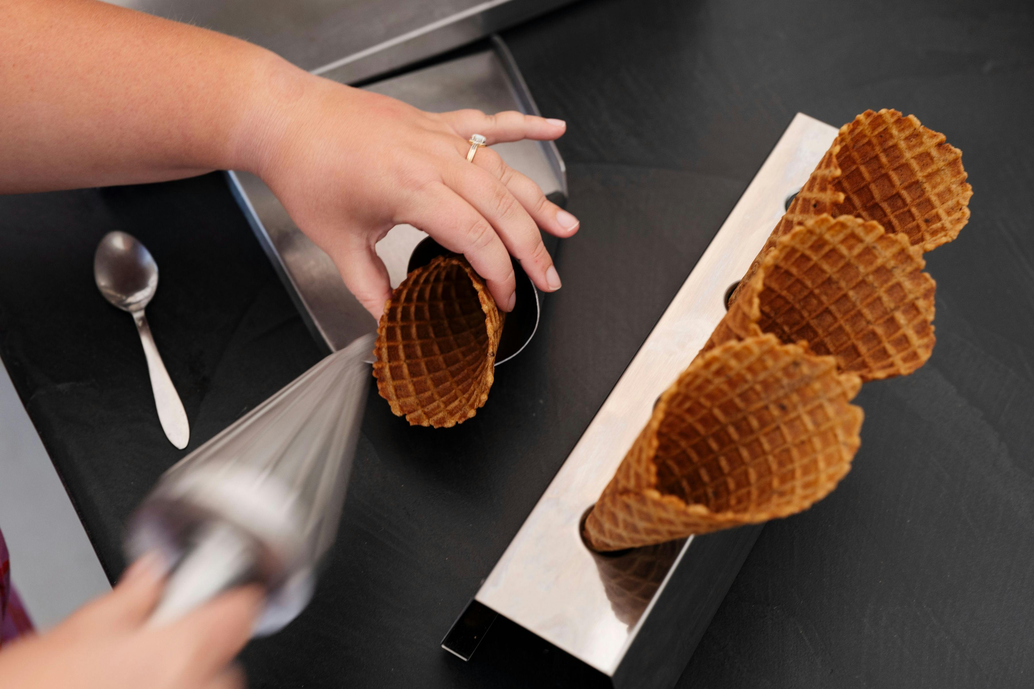 Kuld cone being hand rolled. Our homemade cones are vegan and gluten free!