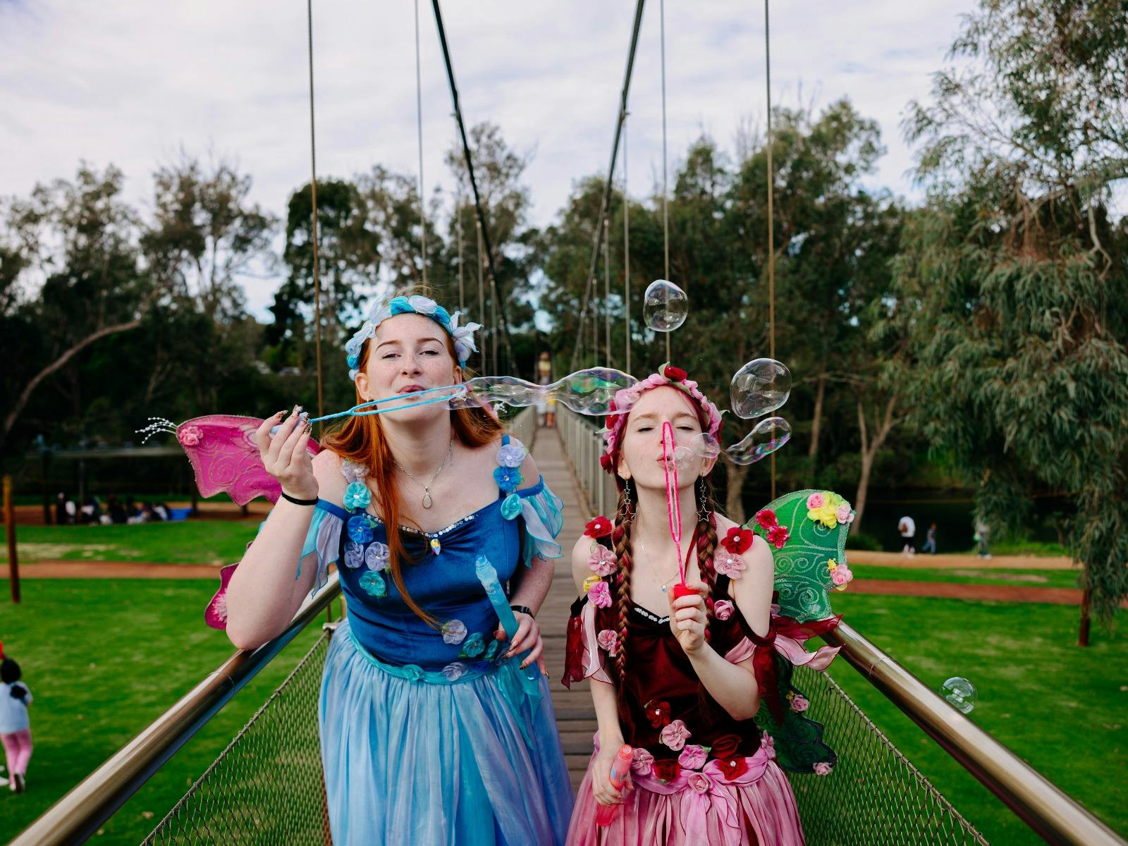 Faries blowing bubbles on the Pinjarra Suspension Bridge