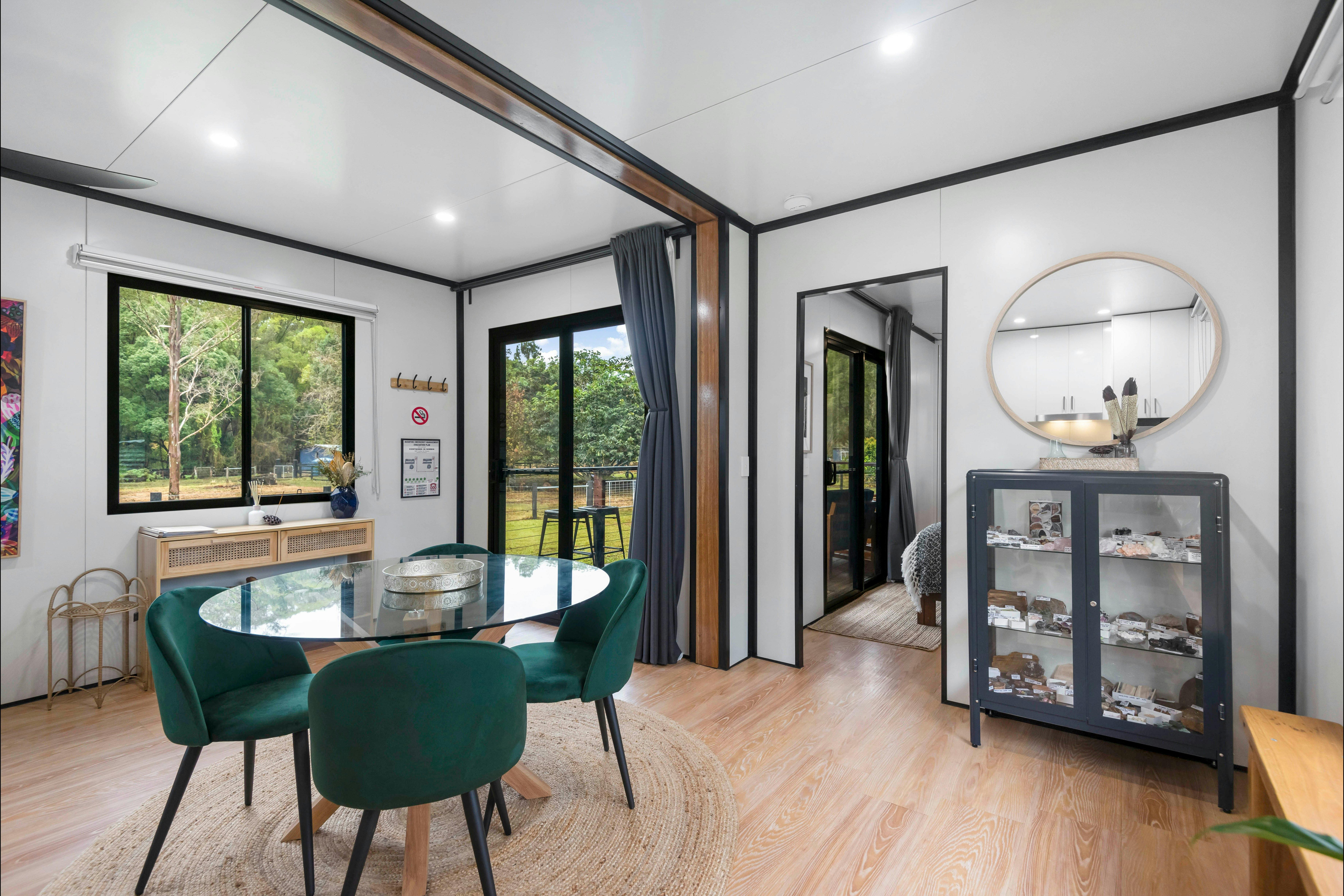 Internal shot of the dining area, entry way, display cabinet