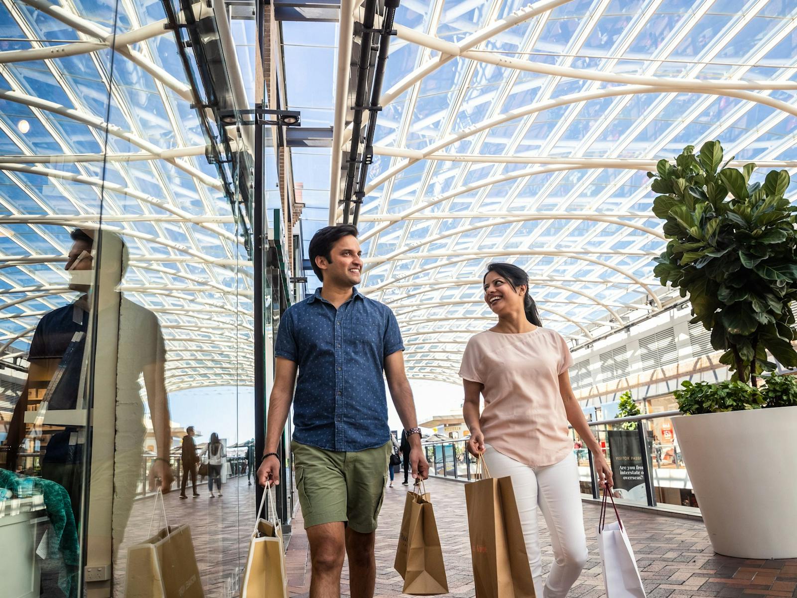 Couple shopping with bags at shopping centre