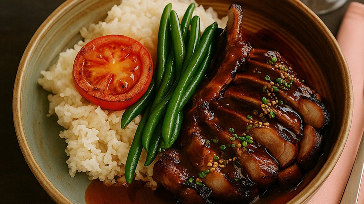 Sriracha tamarind glazed pork ribs, sesame seeds, crispy shallots, chives, asian slaw, and chips​