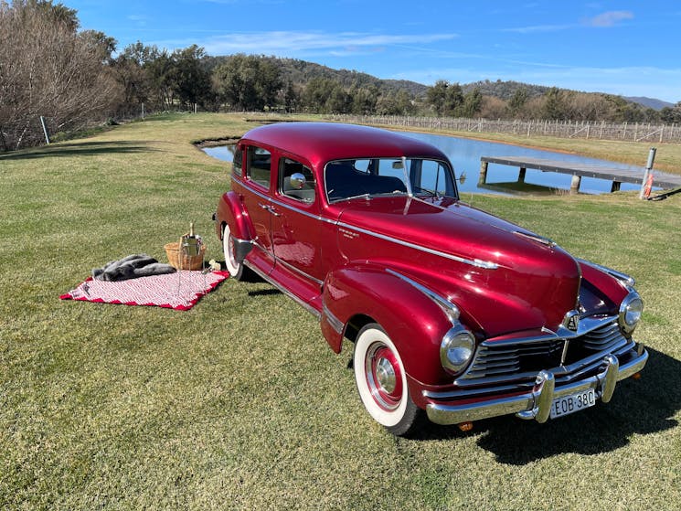 Red 1946 Hudson for wedding, wine tours and special occasions.
