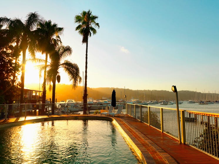 Sunset views over Pittwater from the pool at Metro Mirage Newport