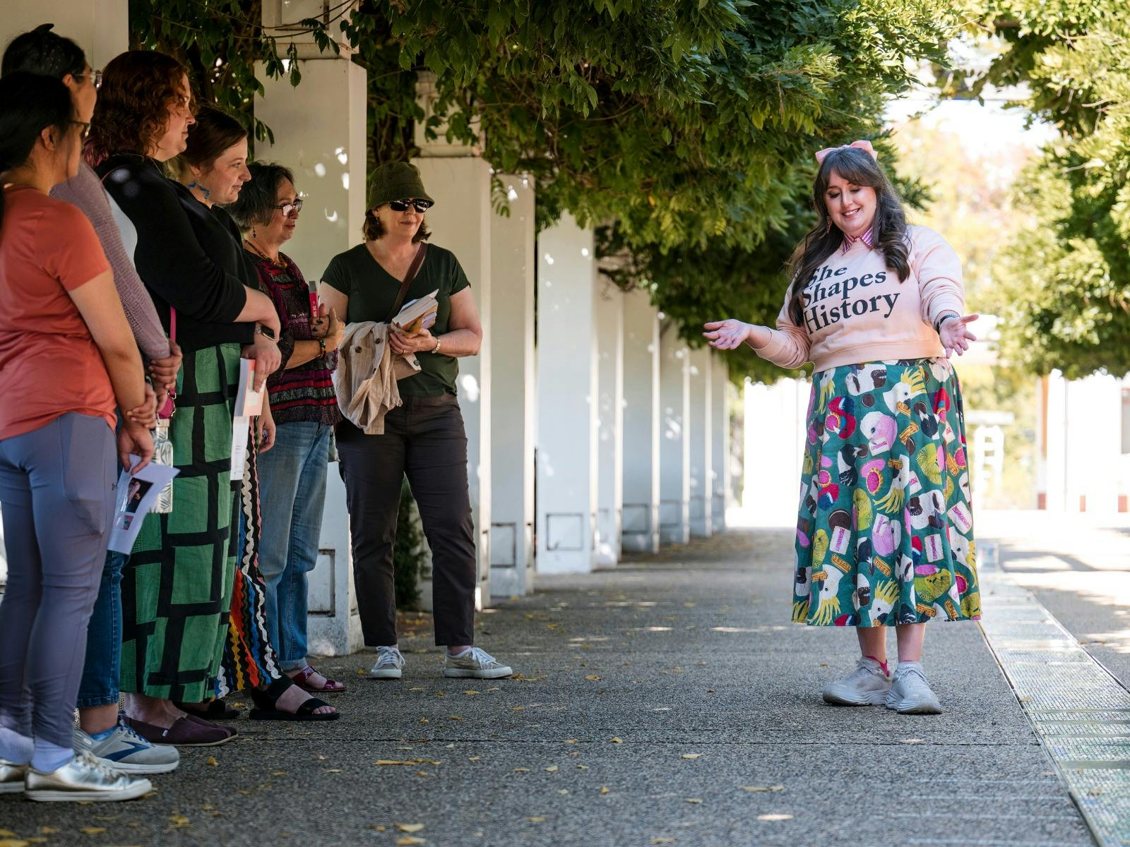 Local guide in Canberra walking with group
