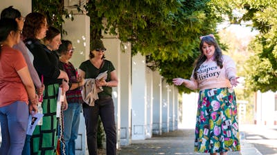 Local guide in Canberra walking with group