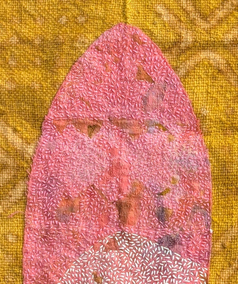 pink and yellow textile
