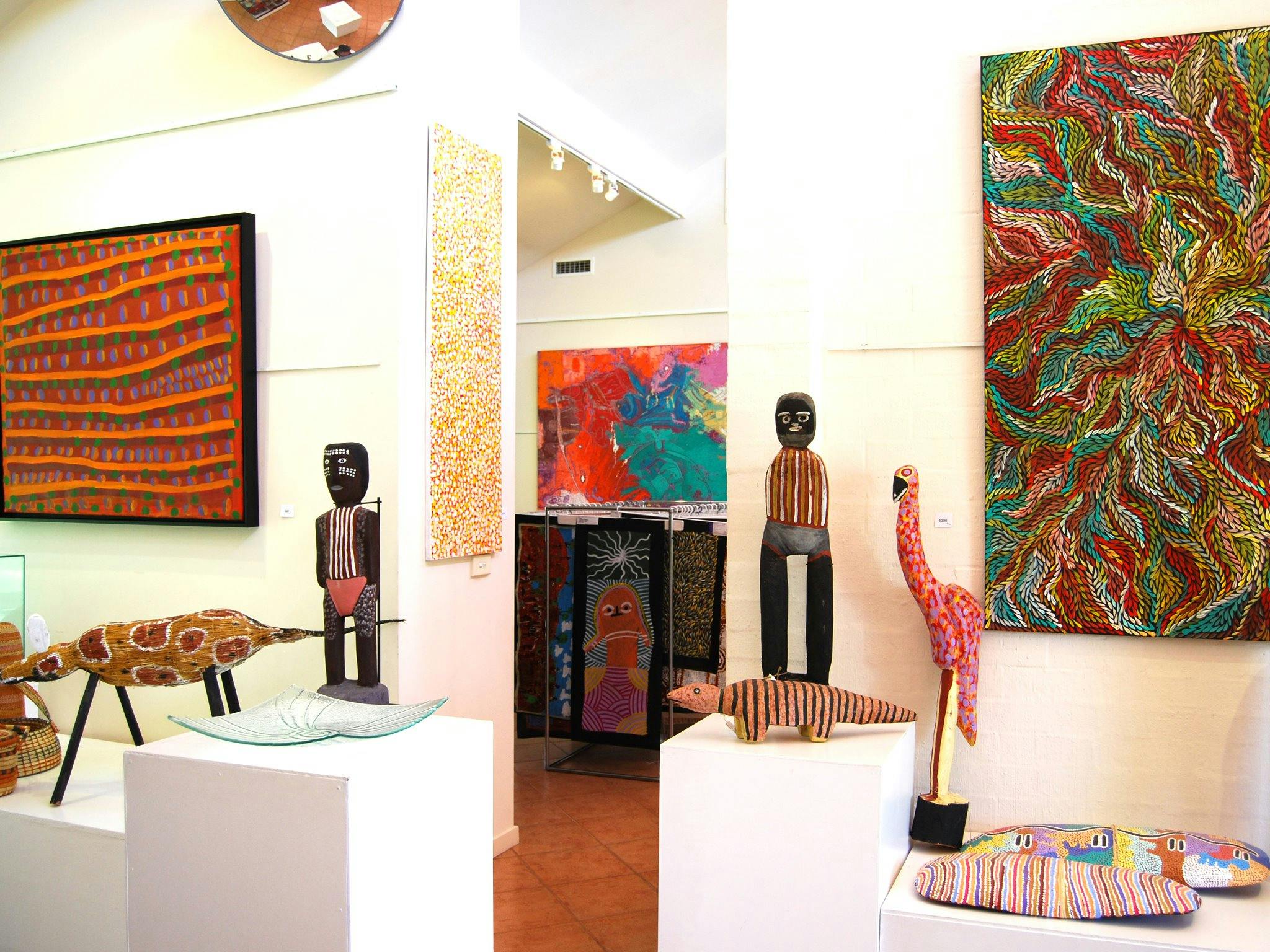 Quality Aboriginal art paintings and carved artefacts.