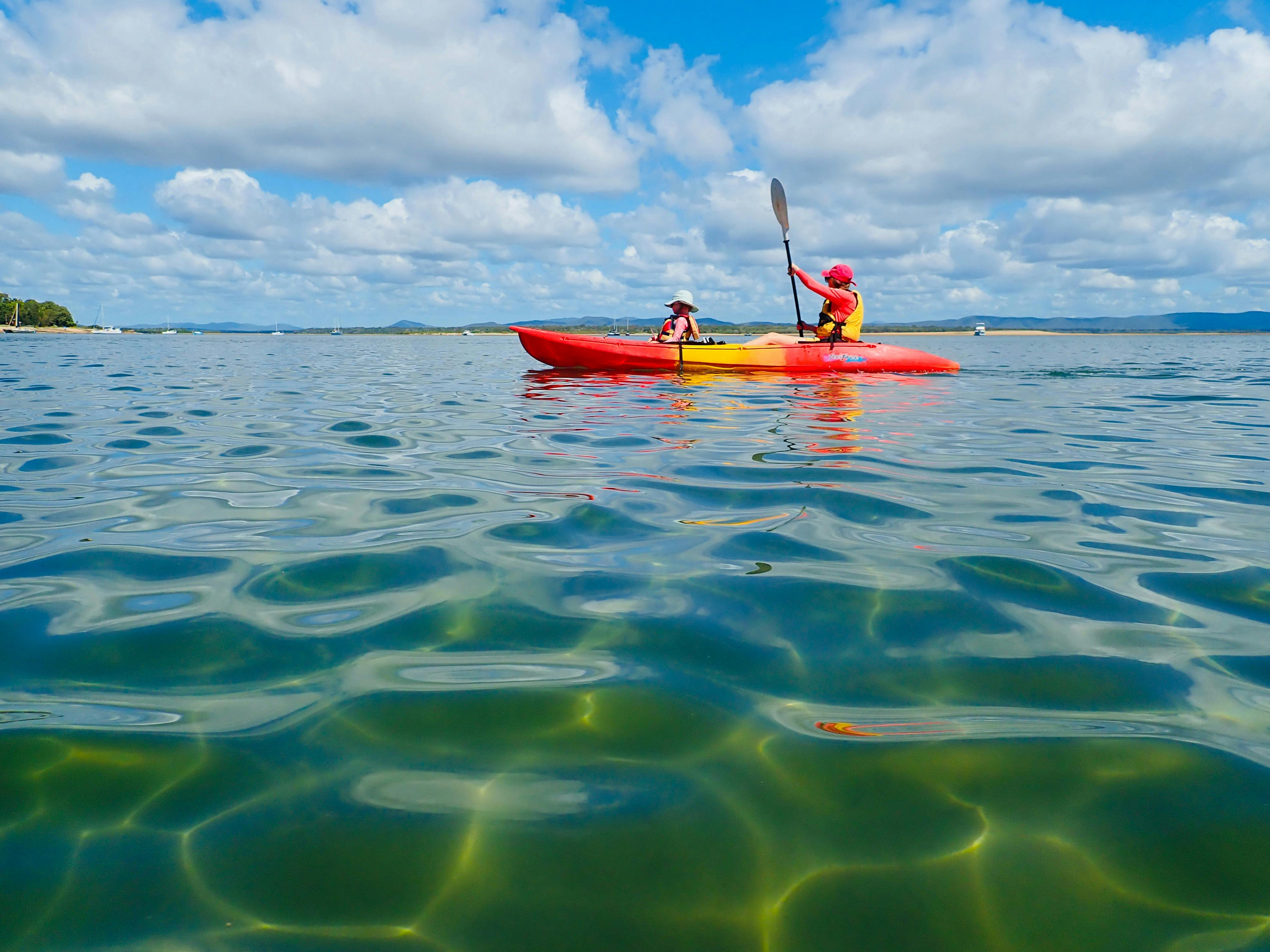 Mum and daughter on a double kayak enjoying the scenery in 1770