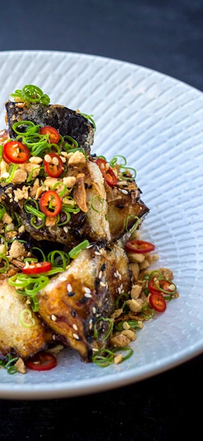 Sweet and spicy eggplant, sesame, shallot and fried peanuts