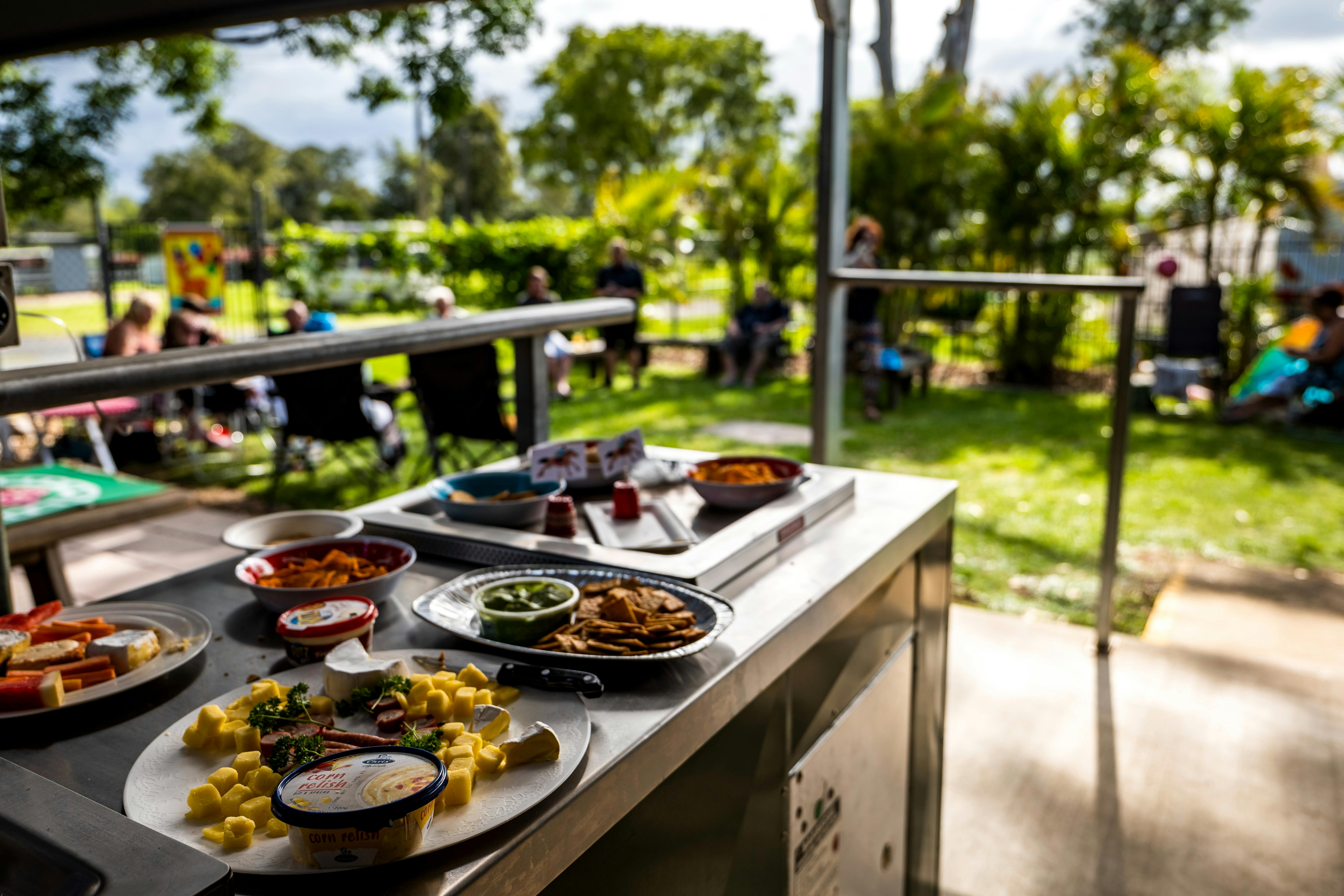 Our lovely Camp Kitchen area. It includes a communal fridge, barbeques, a sink and a television.
