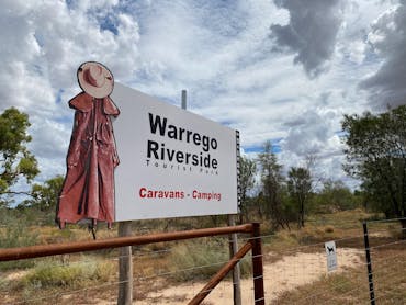 The sign for The Warrego Riverside Tourist Park.
