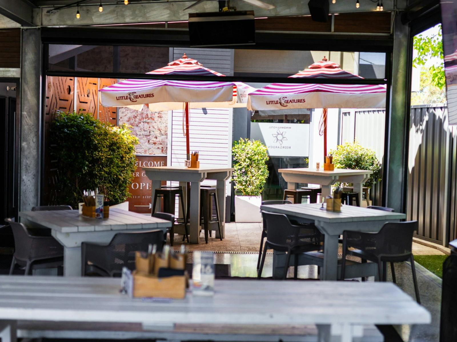 Windmill Hotel Beer Garden with bar and large TV
