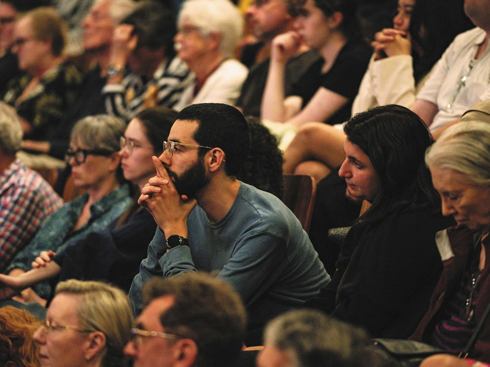 A photo of a seated audience