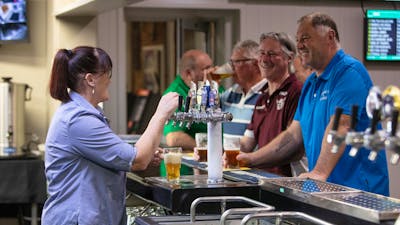 Nat serving drinks Crookwell Services Club