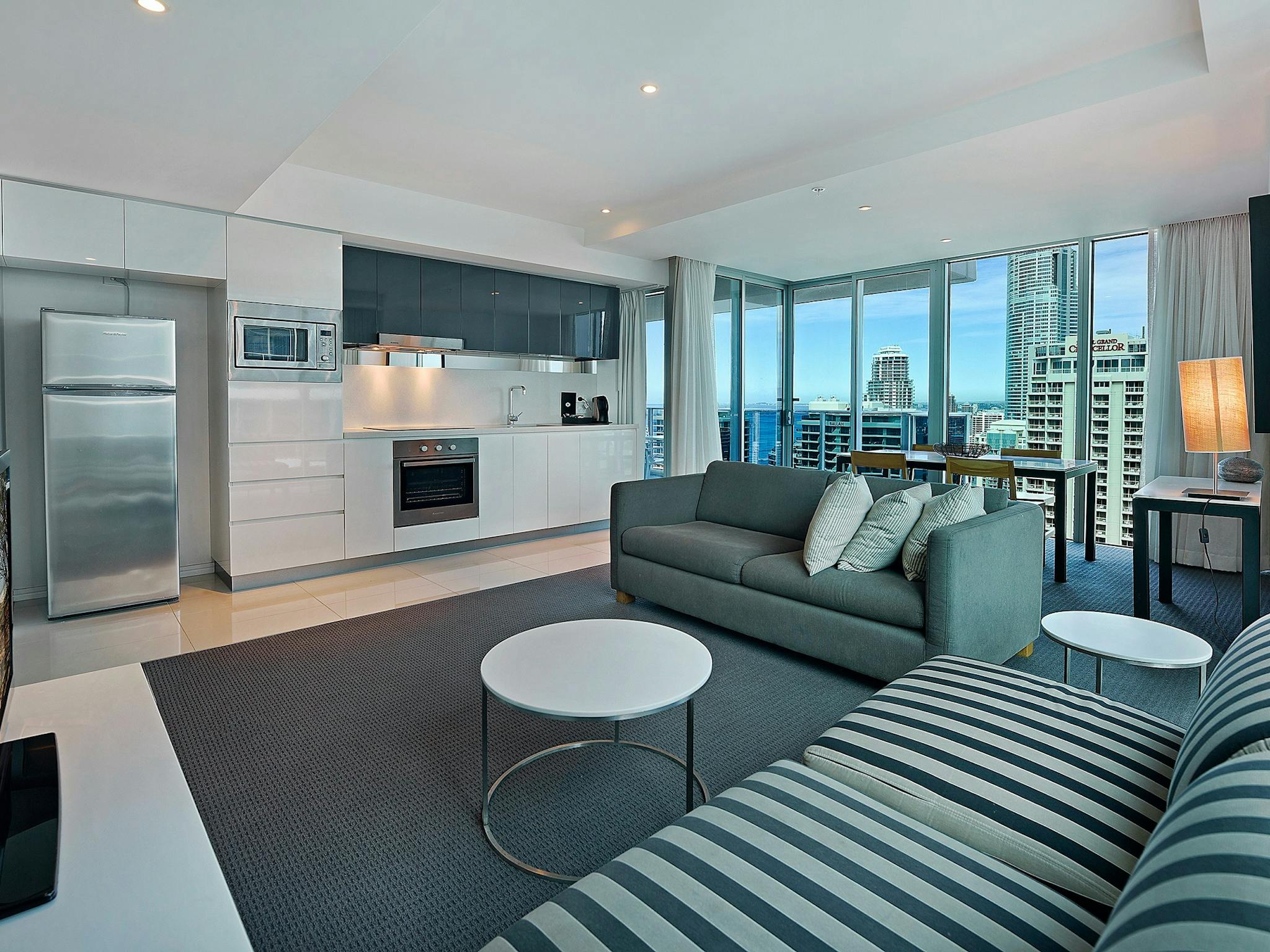 Living room, kitchen, dining, balcony - open plan living - Hilton Residences Surfers Paradise Living room, kitchen, dining, balcony - open plan living - Hilton Residences Surfers Paradise