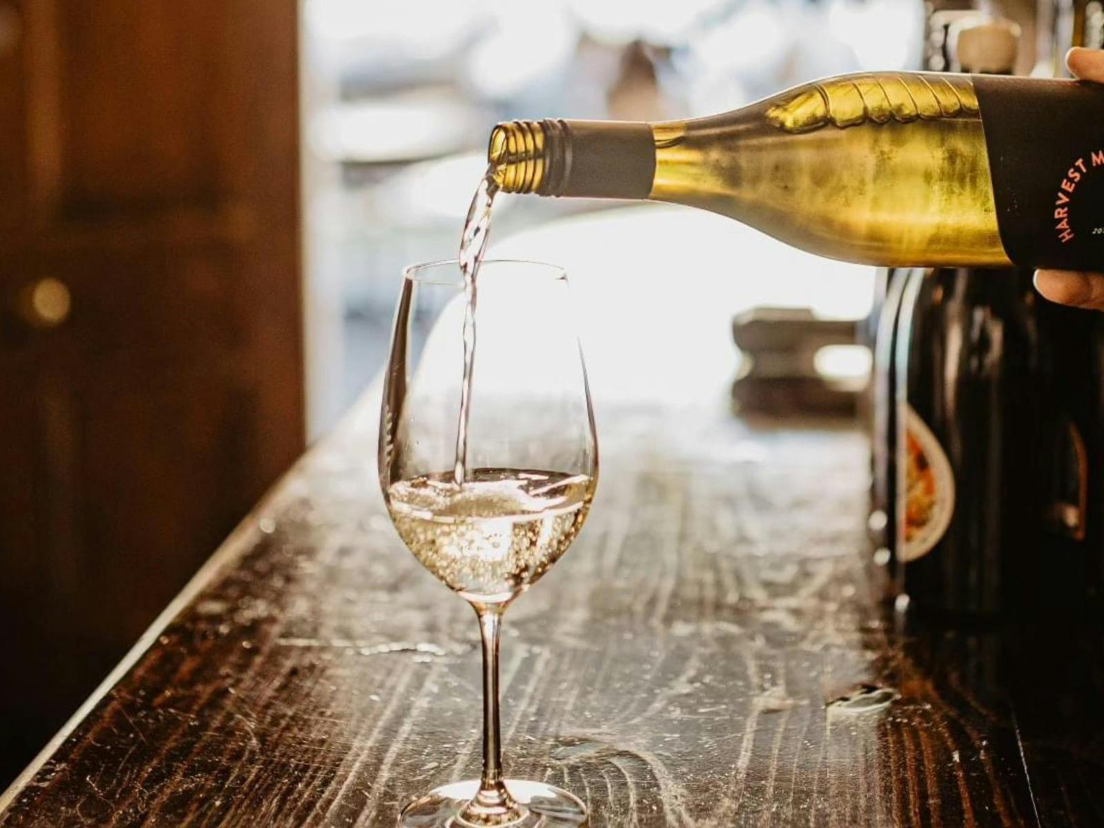 wine being poured into a glass