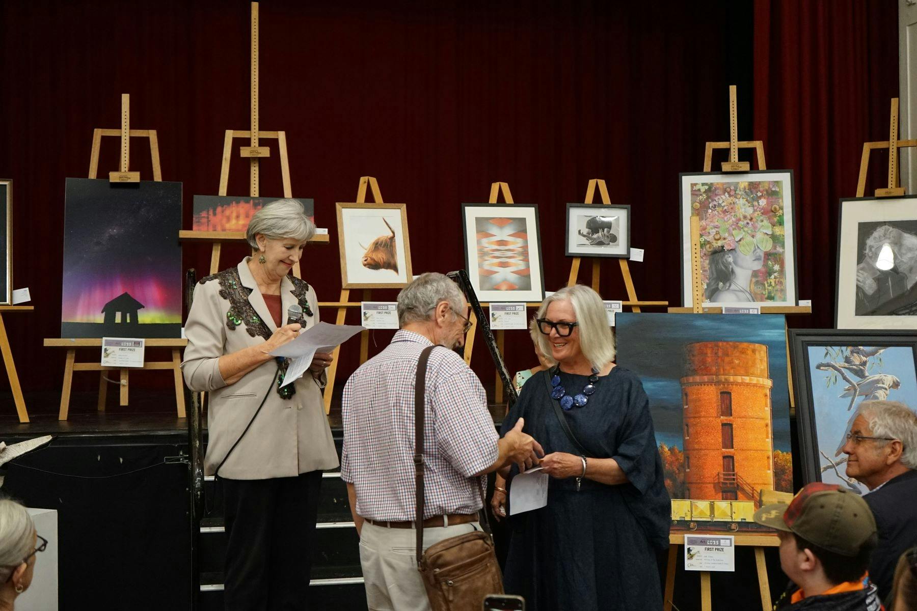 An artist receiving an award
