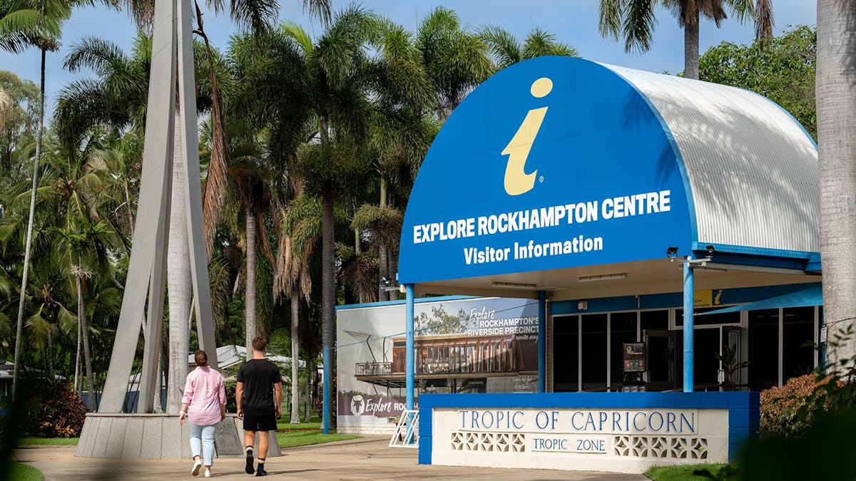 Young travellers visit the Tropic of Capricorn Spire.