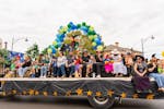 A parade float with families
