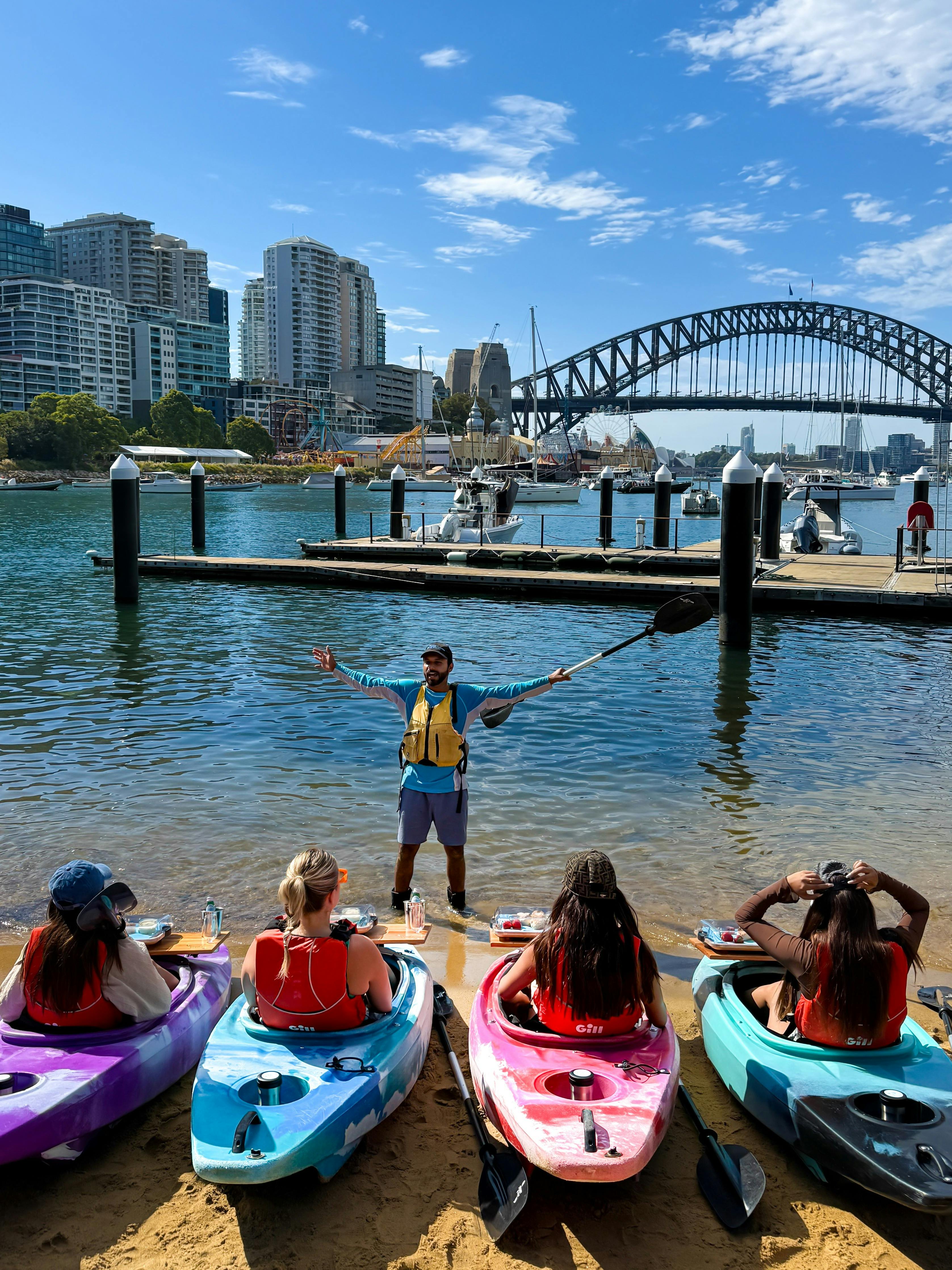 Sydney By Kayak guide briefing customers on the Morning Tea Kayak on Sydney Harbour