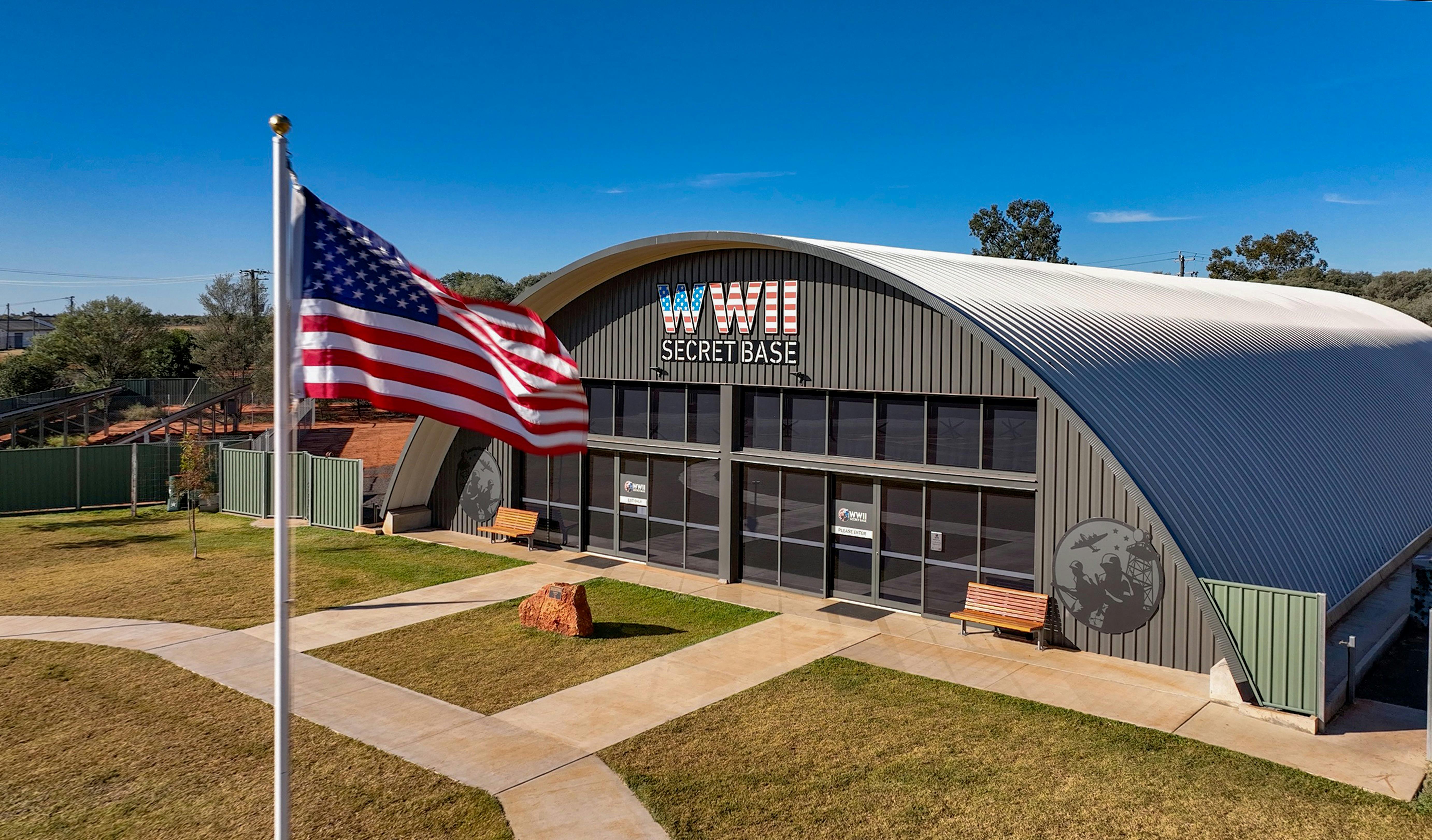 drone image taken on the base durring a clear day with a us flag flying in the foreground