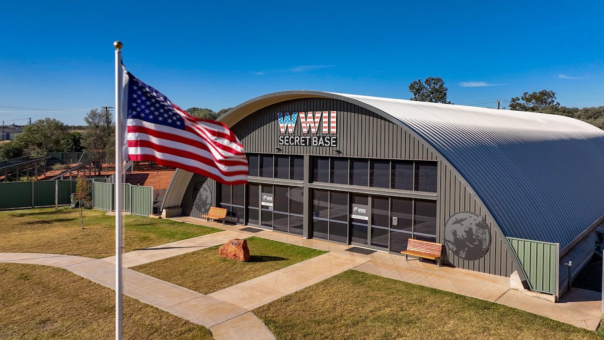drone image taken on the base durring a clear day with a us flag flying in the foreground