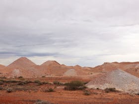 Mullock heaps as a result of mining surround Coober Pedy