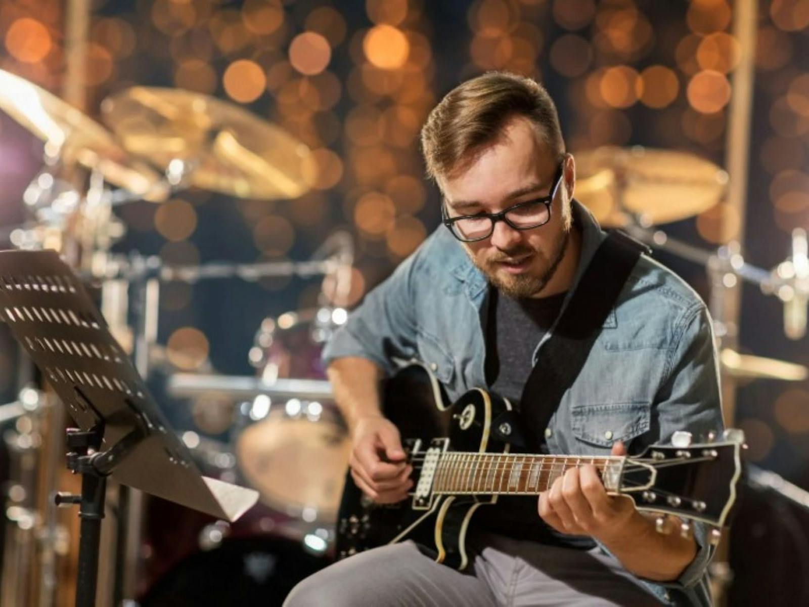 Image of a guitarist performing on stage