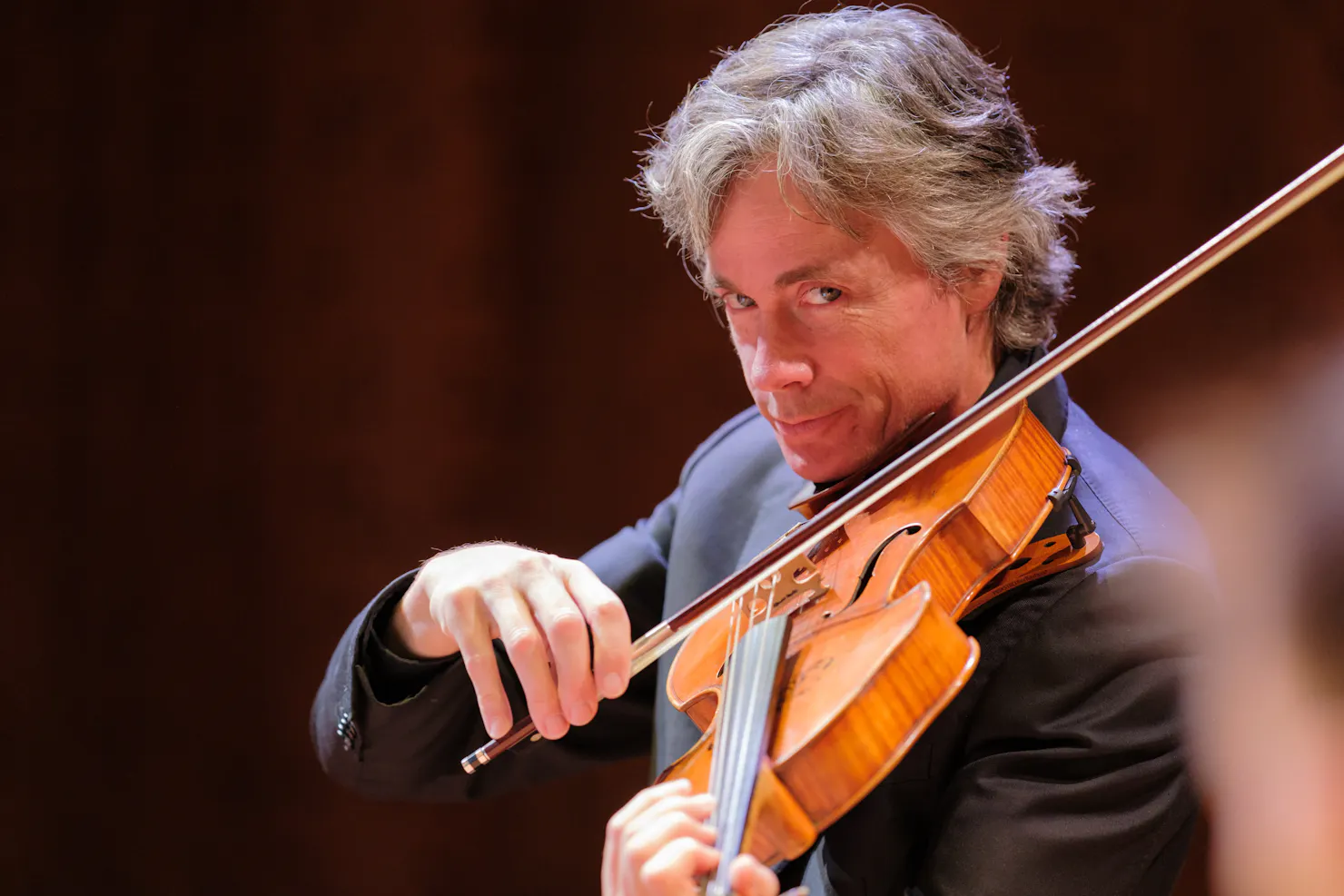 man playing viola