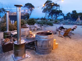Wood fired hot tubs with ocean views and toasty outdoor fires.