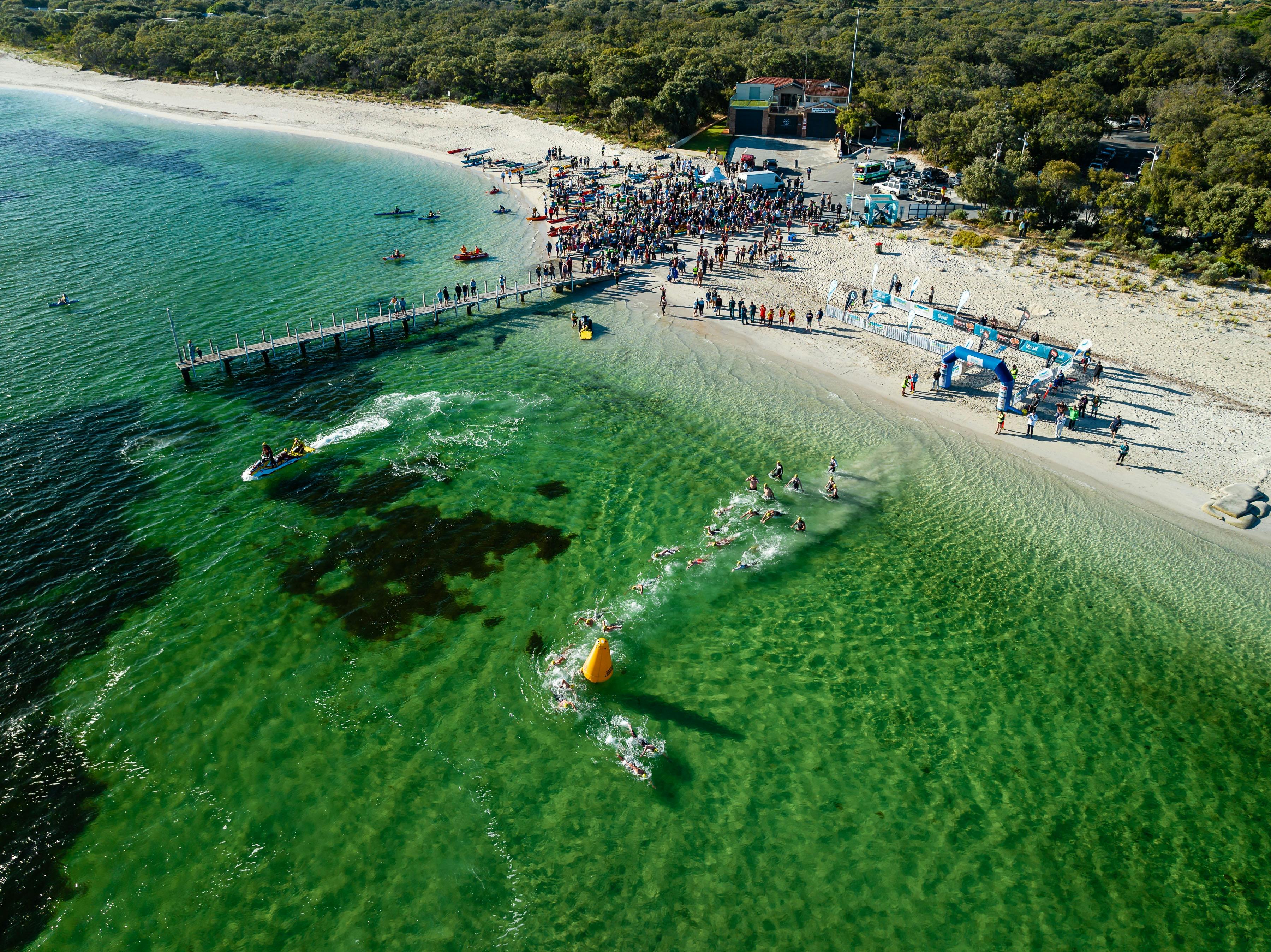 Swimmers and supporters prepare for the start