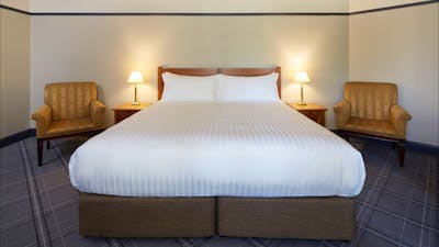 A bed at the Brassey Hotel