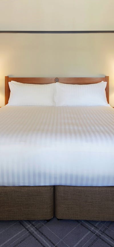 A bed at the Brassey Hotel