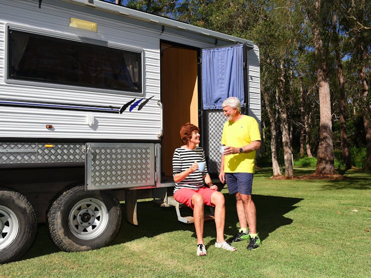 Flat grassy powered sites to park your caravan