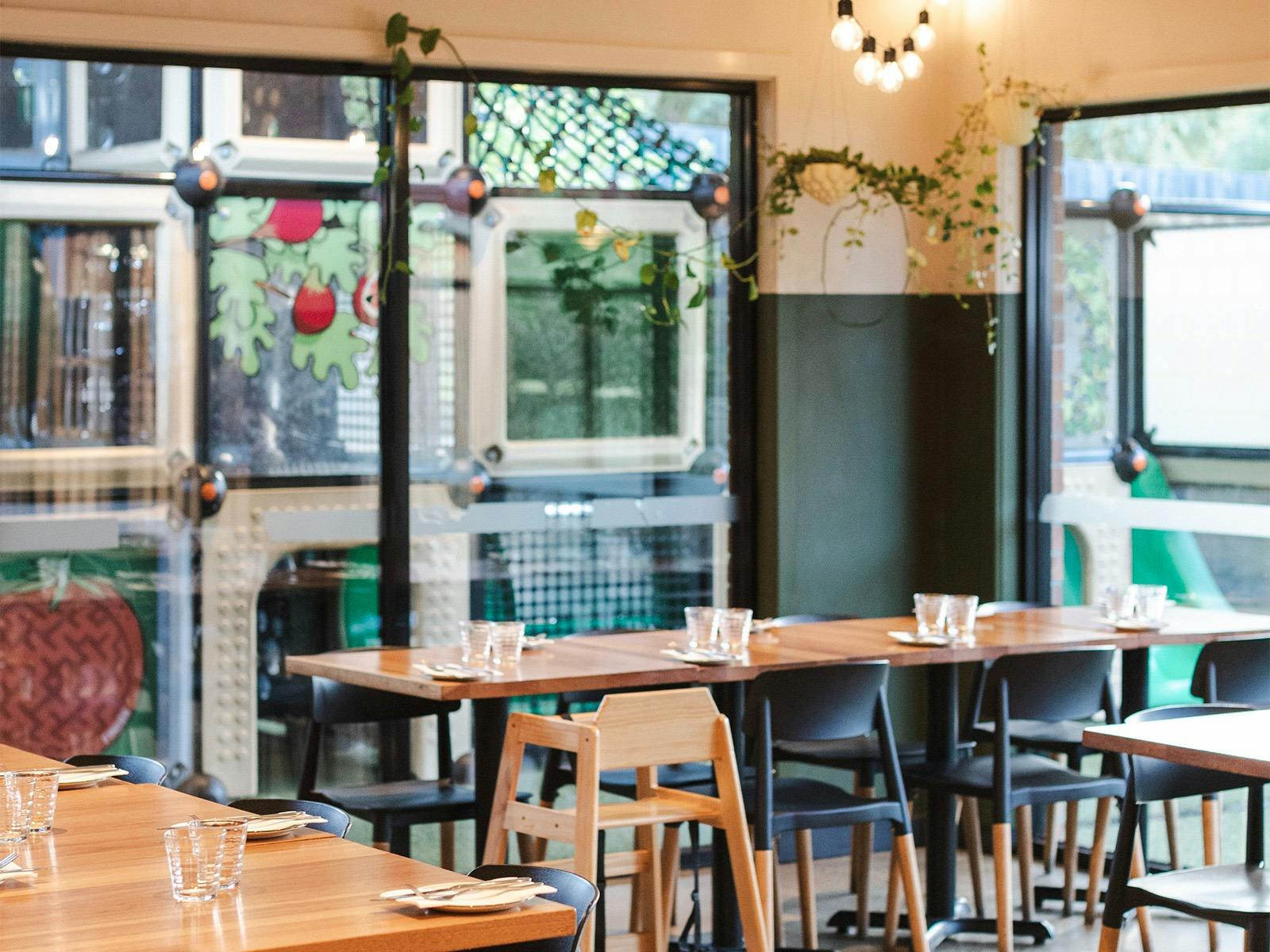 A family friendly restaurant with a covered and fenced playground