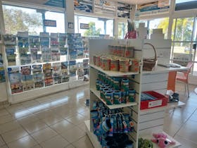 souvenirs and area guides in brightly lit information centre