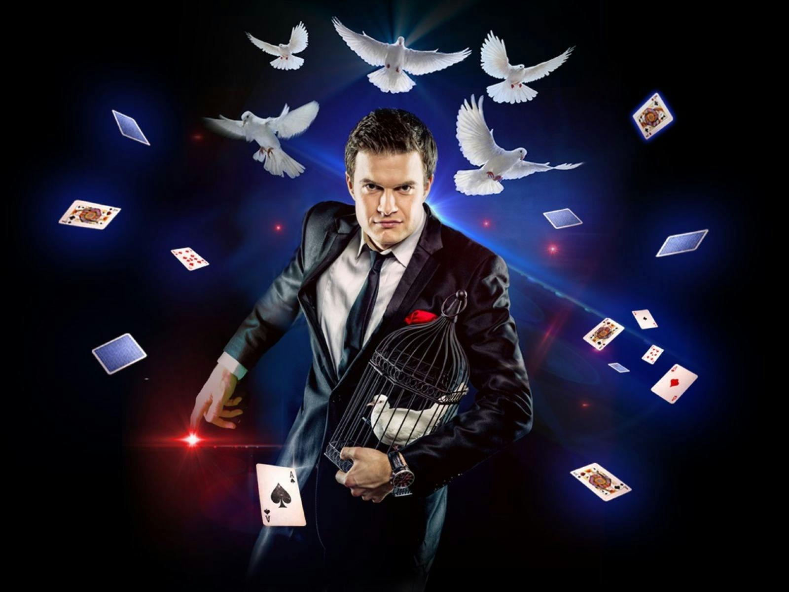 a magician with white doves flying above him with Playing cards falling around him.