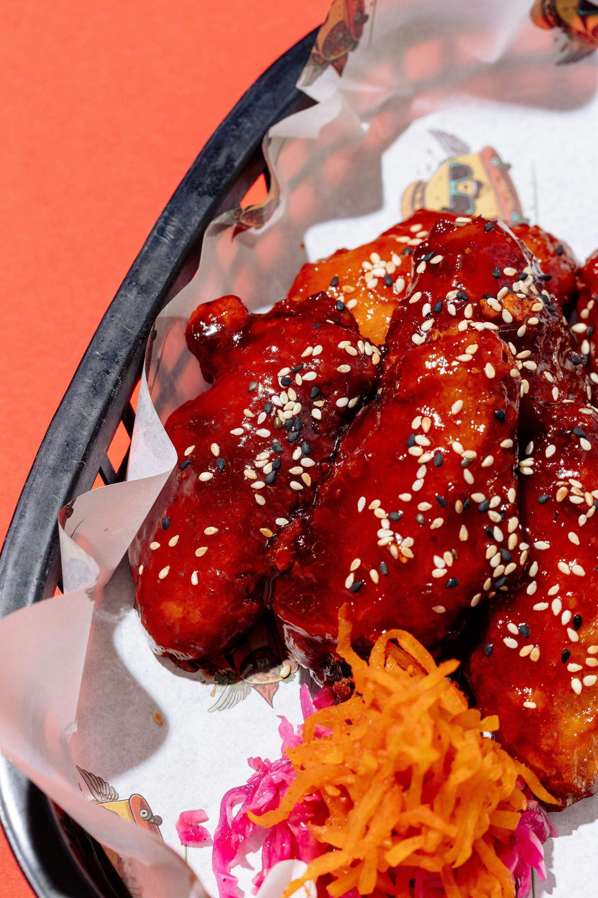 Crispy wings coated in Sweet & Spicy glaze