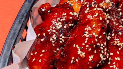 Crispy wings coated in Sweet & Spicy glaze