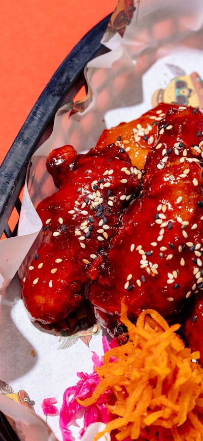 Crispy wings coated in Sweet & Spicy glaze