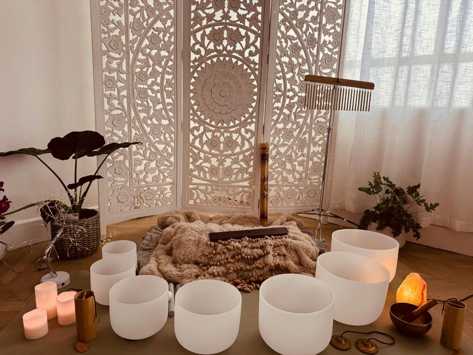 Sound bath setting with bells and candles