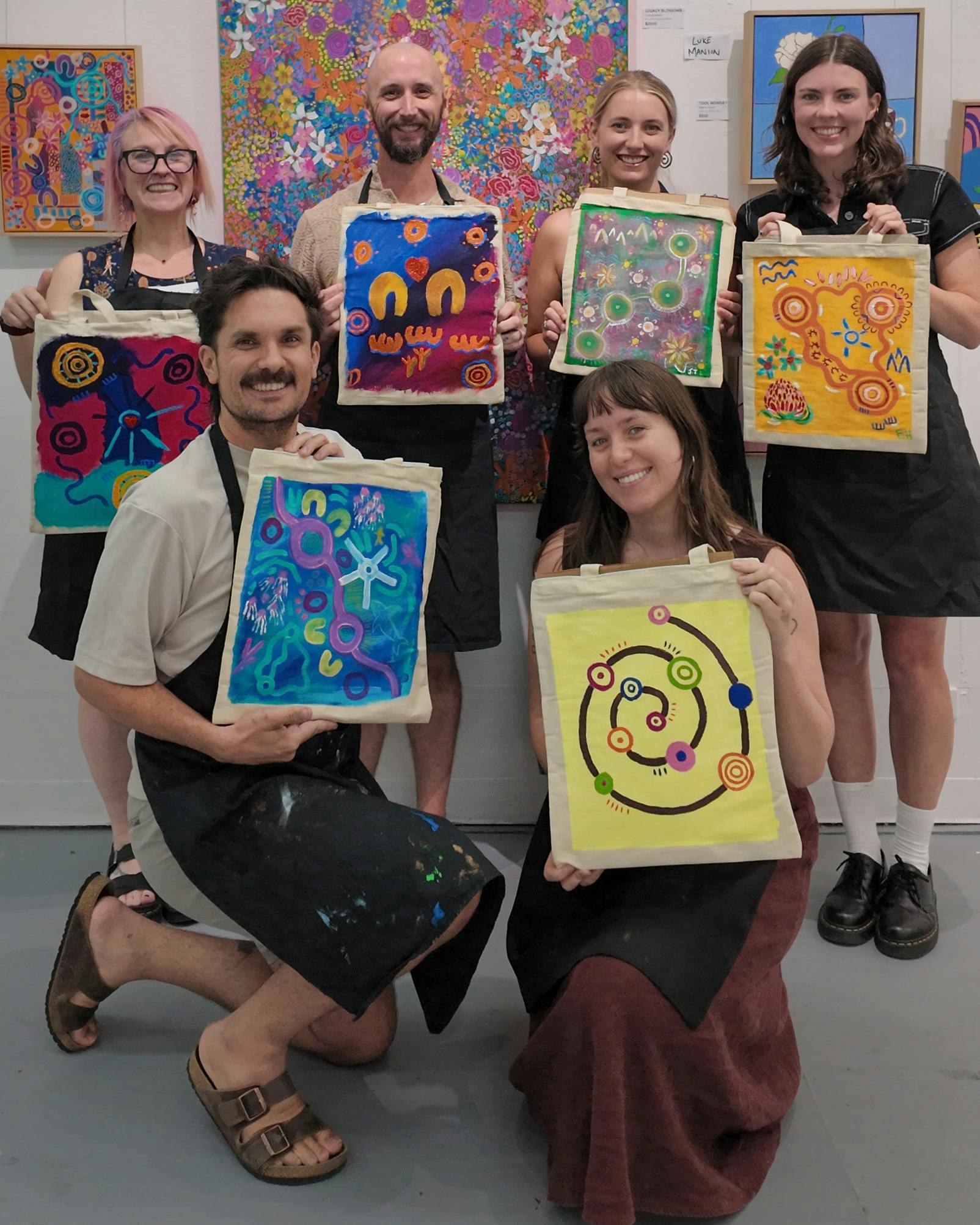 Photos of people displaying their tote bag creation proudly. All smiling.